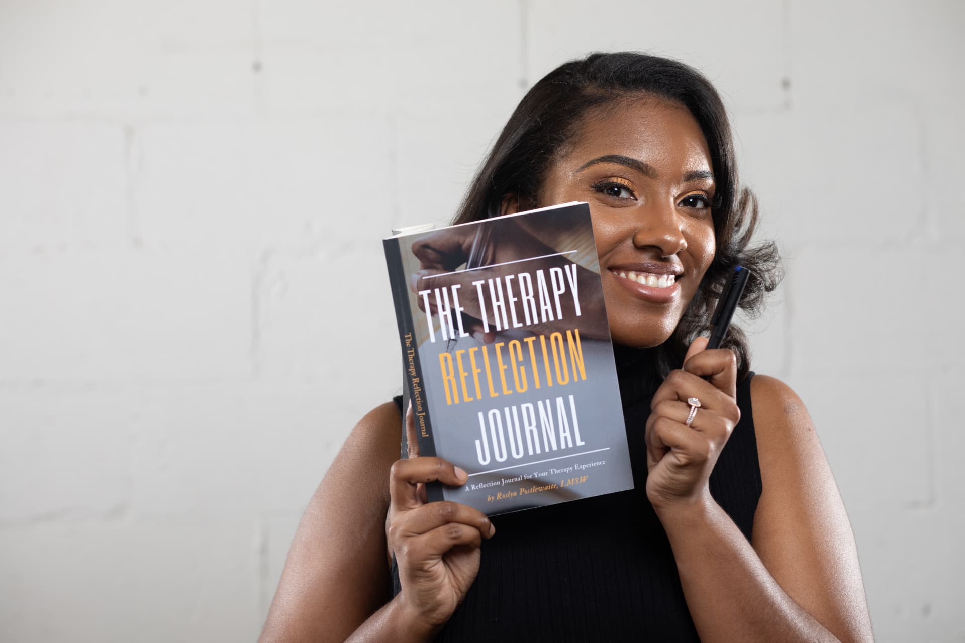 Author portrait with a reflection journal
